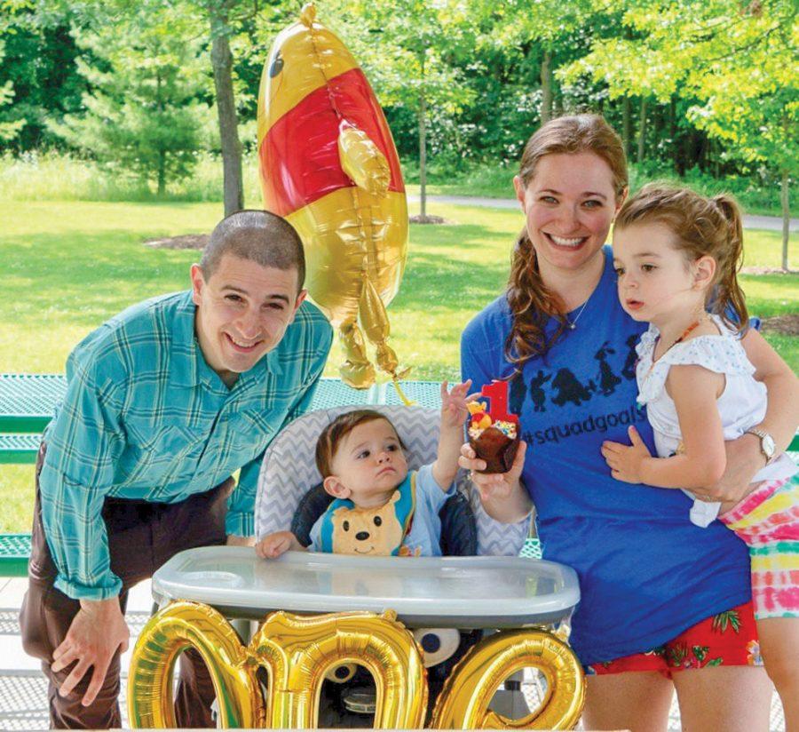 Haimann is shown with his wife, Sarah, and their two children. 