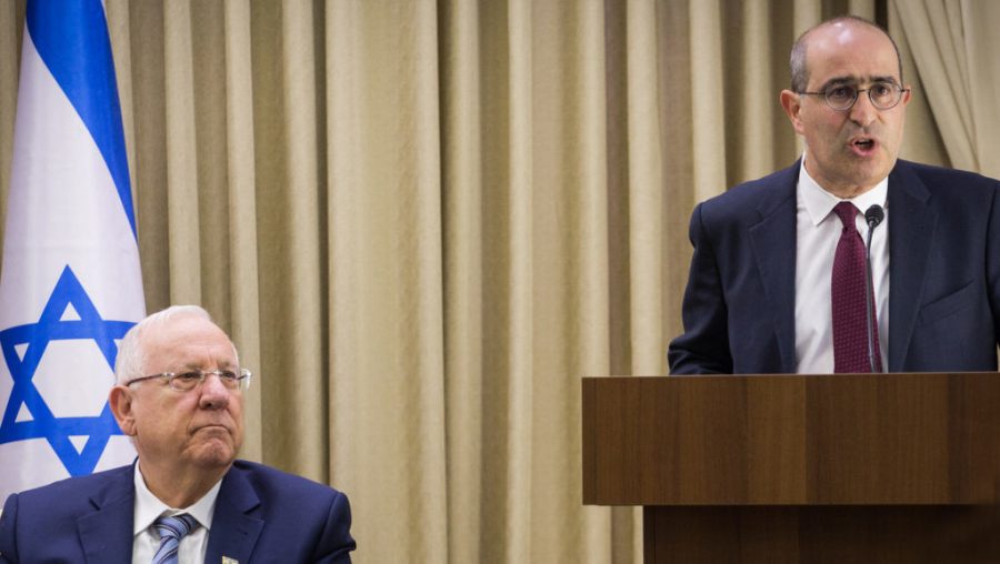 Gideon Taylor of the Claims Conference speaks as Israeli President Reuven Rivlin look on in Jerusalem in 2017. (Hadas Parush/Flash90)