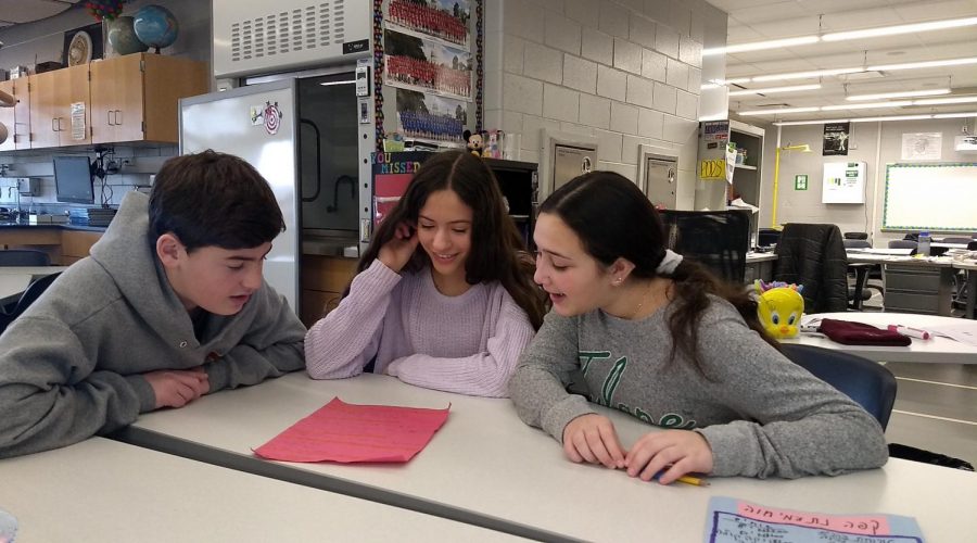 Students+in+an+eighth-grade+Hebrew+class+at+Alan+B.+Shepard+Middle+School+in+Deerfield%2C+Ill.%2C+write+a+Hebrew+screenplay+together%2C+Dec.+13%2C+2019.+%28Ben+Sales%29