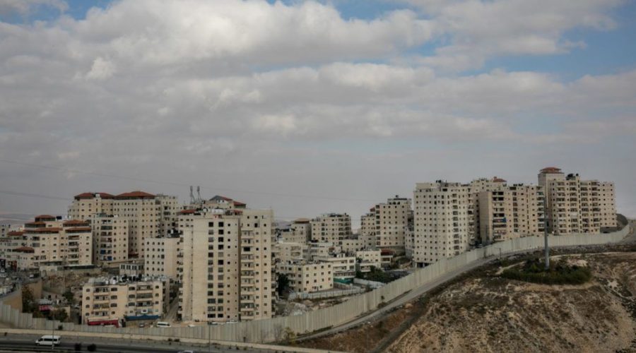 The+Shuafat+neighborhood+of+eastern+Jerusalem+seen+behind+the+separation+wall%2C+Dec.+3%2C+2019.+%28Olivier+Fitoussi%2FFlash90%29