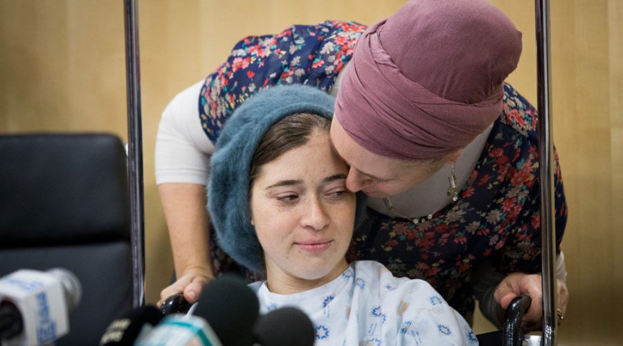 Shira and Amichai Ish Ran hold a news conference last December at the Shaarei Tzedek hospital a week after being injured in a West Bank terror attack. Photo: Yonatan Sindel/Flash 90