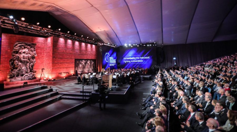 Ukrainian president and his delegation give their seats at Holocaust forum to survivors