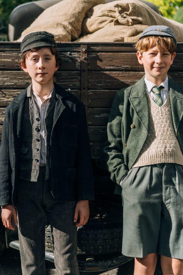 Dovidl (left, played by Luke Doyle) and Martin (played by Misha Handley) in The Song of Names. 