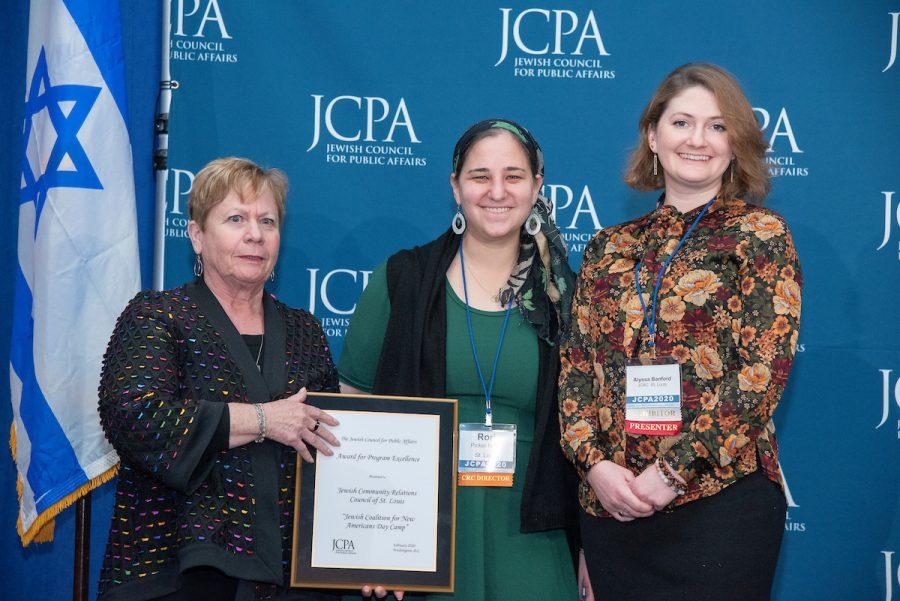 Natalie Silverman (left) of the Jewish Council for Public Affairs presents JCPA’s Program Excellence Award to Maharat Rori Picker Neiss (center) and Alyssa Banford of the Jewish Community Relations Council  of St. Louis. The award honored JCRC’s summer day camp for children of refugees.
