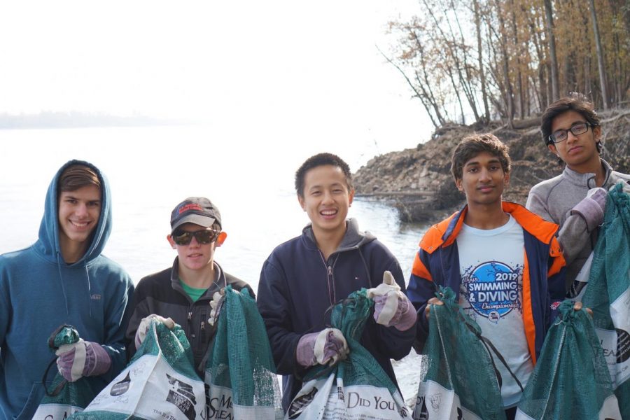 Pictured from left, Evan Schreiner, Harry Shipley, Chris Chen, Rohan Tatikonda, and Avinash Kamath pose for a picture after a hard day of stream cleaning.
