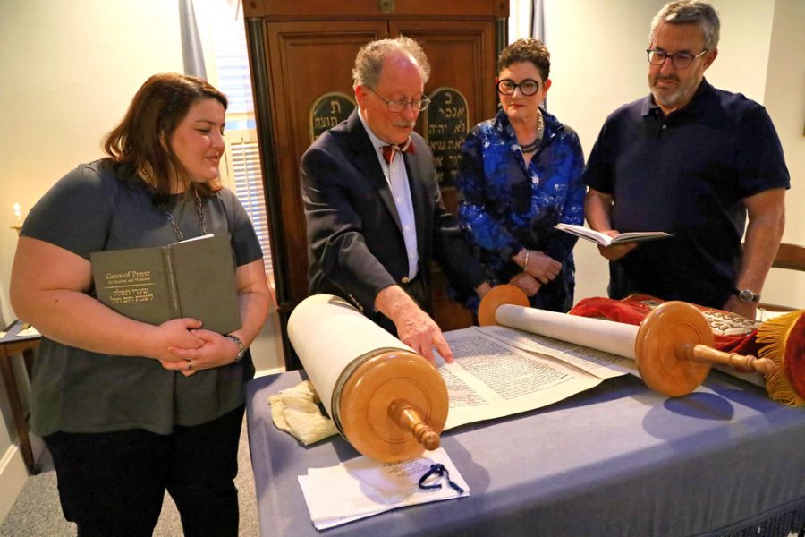 In August 2019, Rabbi Lane Steinger is flanked by Michelle, Esther and  Joel Weltman at Temple Israel in Godfrey, Ill. during a Friday night Shabbat service. 