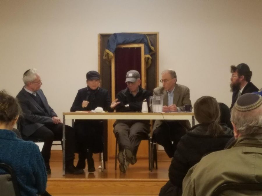 (From left) Infectious disease physicians Morey Gardner, Tessa Gardner, Michael Gutwein and Gregory Storch lead a panel discussion on the coronavirus on Feb. 23 at Bais Abraham Congregation. 