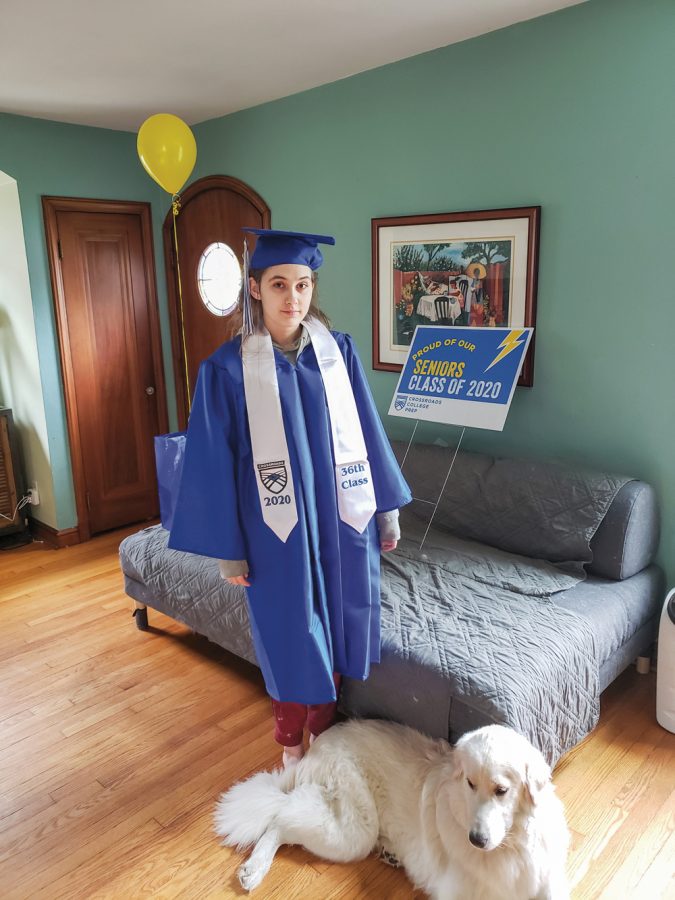 Alia Chappell wears a cap and gown delivered by Crossroads to all seniors. 