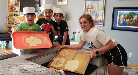 Yishama, Rafi, Max and Yael make homemade matzah. 