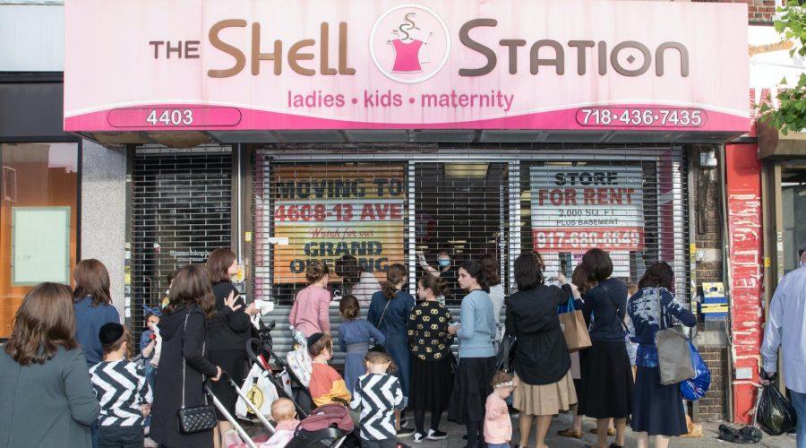 Women stop outside the Shell Station, a store in the Borough Park neighborhood of Brooklyn specializing in modest undergarments for women, May 27, 2020. (Avi Kaye) 