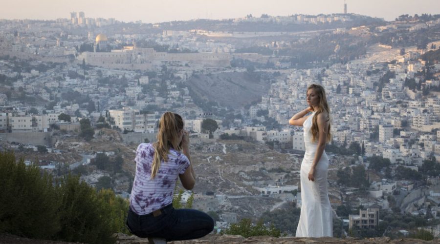 Programs to facilitate pandemic weddings in Israel’s 2 largest cities reflect tension around marriage rules