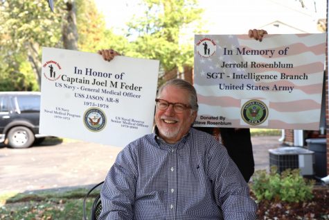 Steve Rosenblum is shown with signs from The Kaufman Fund golf tournament, which he helps arrange. Rosenblum is a board member of The Kaufman Fund, an organization that works to assist veterans. Photo: Bill Motchan
