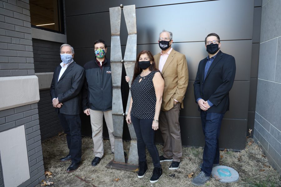 From left: Dan Rosenthal, David Cooperstein, Randi Mozenter, Michael Staenberg and Tony Patterson are shown outside the new Kol Rinah building.