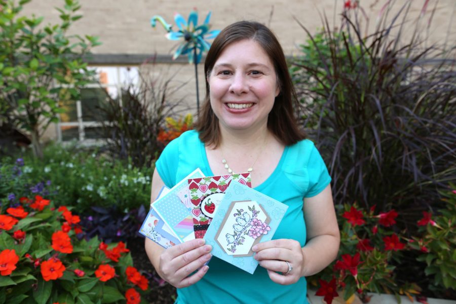 Aleeza Granote with a few of the handmade cards sent out by her nonprofit, Card Care Connection.