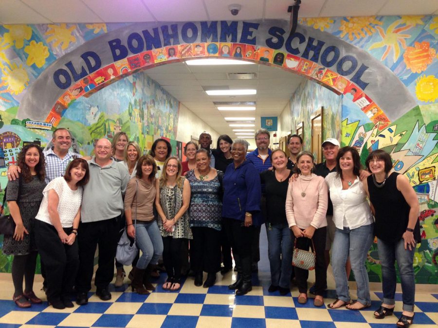 Members of the 1973-74 first-grade class at Old Bonhomme School gather to celebrate teacher Christine Williams’ retirement in 2005. John Green is second from left; Williams is in the middle.