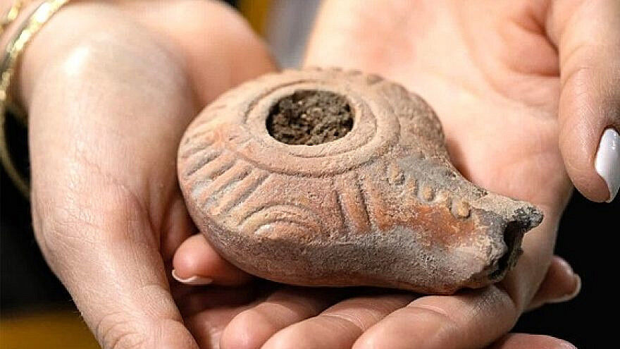 The 2,000-year-old candle-holder unearthed in the City of David in Jerusalem, Dec. 2020. Credit: Koby Harati/City of David archives.
