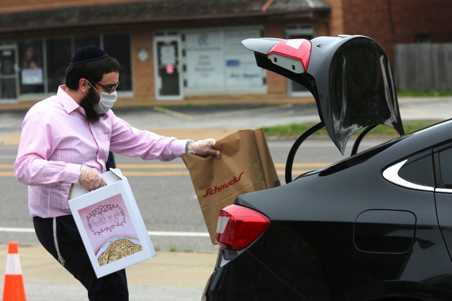 Chabad of Greater St. Louis distributes free ‘Seder-to-Go’ kits in a drive-through line outside the Morris & Ann Lazaroff Chabad Center in University City on Sunday, April 5. The kits included traditional Passover foods, a seder plate and instructions on how to conduct a Passover seder.