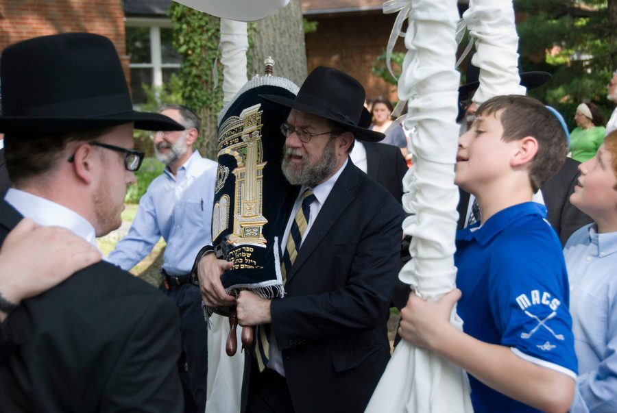 In this 2014 image, Rabbi Menachem Greenblatt takes part in a procession marking the completion of a new Torah scroll for the St. Louis Kollel. File photo: Donald Meissner
