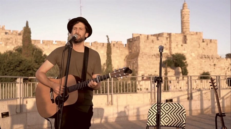Israeli singer Yair Levi performs in Jerusalem. His Covid-era hit resulted in his collaboration with Lebanese artist Carine Bassili. Photo courtesy of Yair Levi