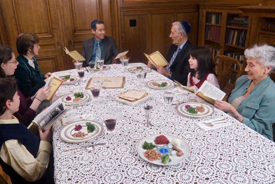 A family celebrates the seder. (Leland Bobbe/Getty Images)