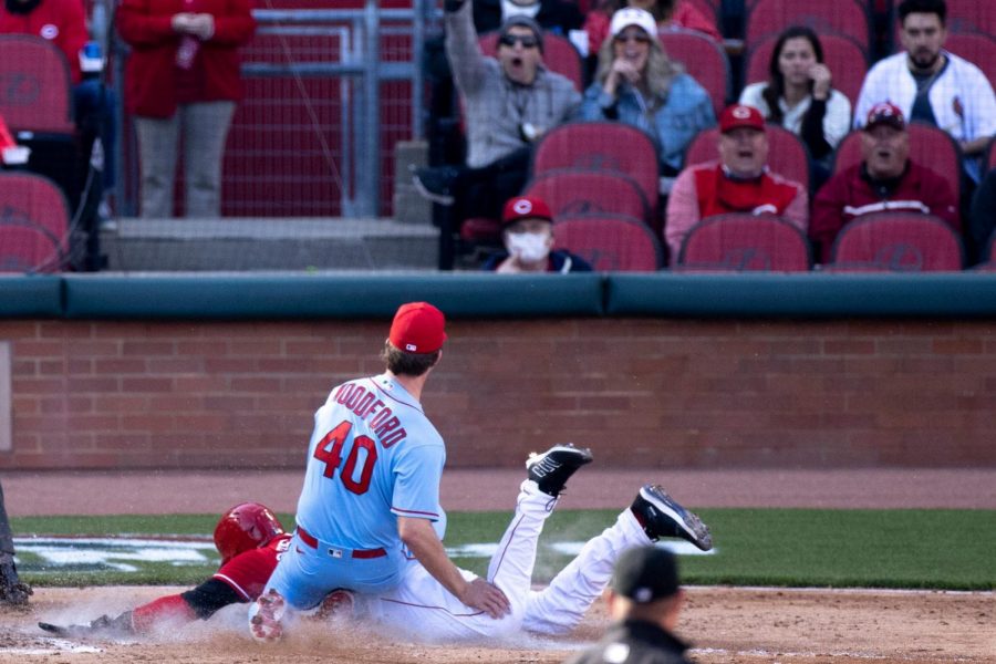 Cincinnati+Reds+right+fielder+Nick+Castellanos+scores+on+a+wild+pitch+as+St.+Louis+Cardinals+starting+pitcher+Jake+Woodford+attempts+to+tag+him+at+home+in+the+fourth+inning+on+Saturday%2C+April+3%2C+2021.+%28USA+Today+Sports%29