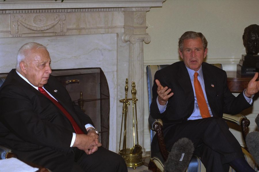 Before learning of the bombing in Rishon LeZion, Prime Minister Ariel Sharon and President George W. Bush meet at the White House on May 7, 2002, to discuss how to end the Second Intifada and make progress toward peace.