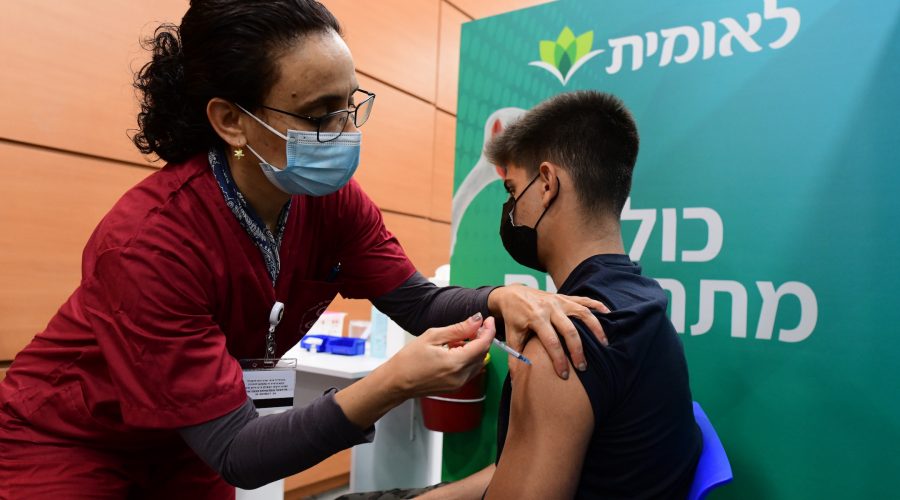 An+Israeli+student+receives+a+COVID-19+vaccine+injection+at+a+vaccination+center+in+Tel+Aviv%2C+Jan.+23%2C+2021.+%28Avshalom+Sassoni%2FFlash90%29%0A