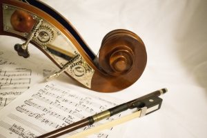 Image of a violin and sheet music