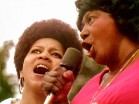 Mavis Staples (left) and Mahalia Jackson sing ‘Precious Lord’ at the 1969 Harlem Cultural Festival in this image from the documentary “Summer of Soul (...Or, When the Revolution Could Not Be Televised).” Photo: Searchlight Pictures