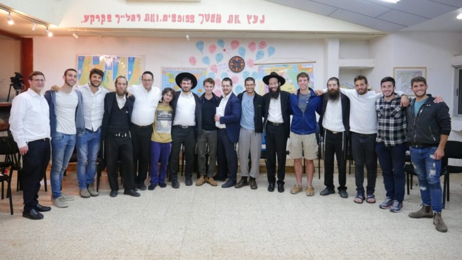 Students at a secular high school with haredi visitors from the unity project of Be a Mensch Foundation. Photo courtesy of Be a Mensch Foundation