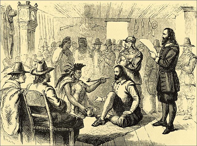 Massasoit ( leader of the Wampanoag) and governor John Carver smoking a peace pipe.