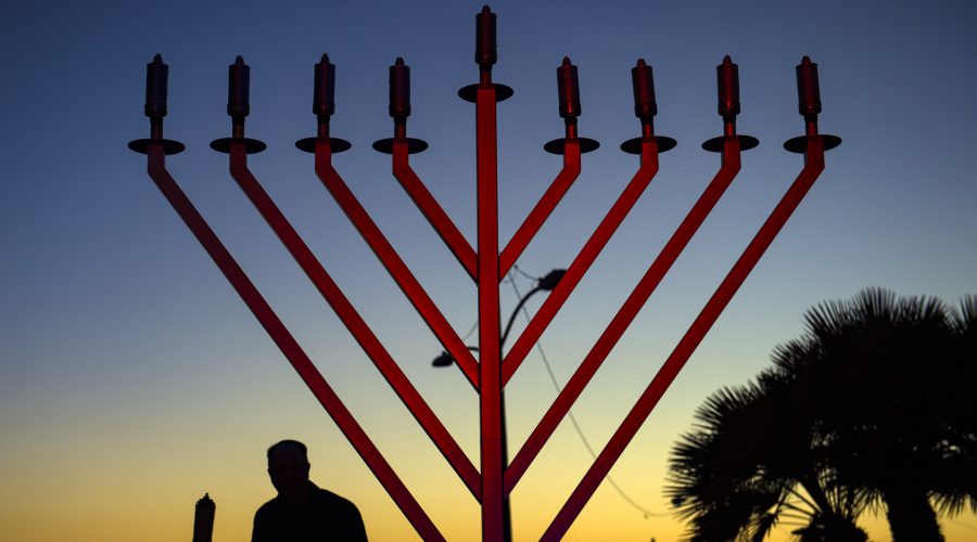 Austin Chabad lights menorah at the overpass where antisemitic banners were hung last month