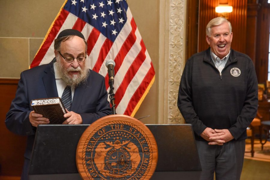 Rabbi+Yosef+Landa%2C+regional+director+of+Chabad+of+Greater+St.+Louis%2C+presents+Gov.+Mike+Parson+with+a+leatherbound+Jewish+Prayer+Book+inscribed+with+the+Governor+and+First+Ladys+names.+Photo%3A+Julie+Smith%2FChabad+of+Greater+St.+Louis