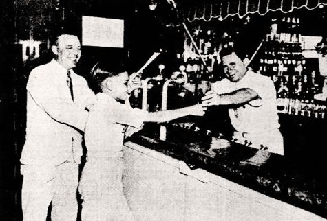 Morris Glaser (right) at Glaser Drugstore, Clayton & Big Bend, 1935