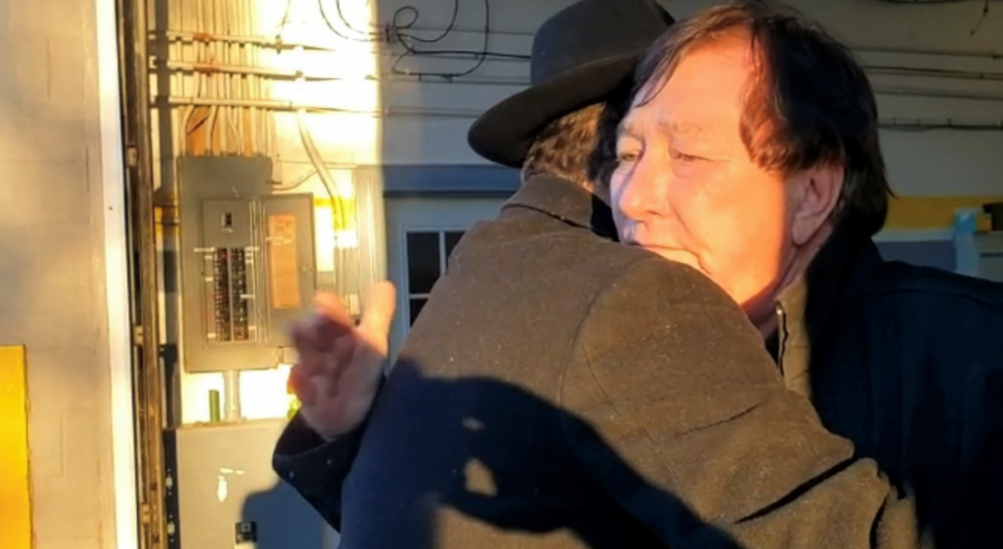 Rabbi Shlomo Litvin, co-director of Chabad of the Bluegrass, embraces a resident in one of Kentuckys hard-hit areas after a series of tornadoes decimated homes and other buildings in parts of the state, December 2021. Source: Rabbi Sholom Litvin/Twitter.