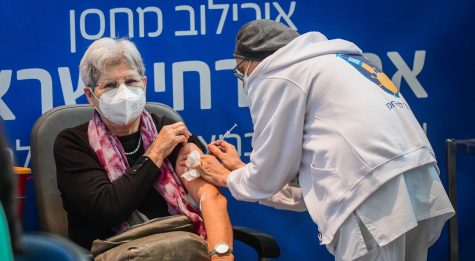 Israel to begin administering 4th coronavirus shot to medical workers and adults over 60