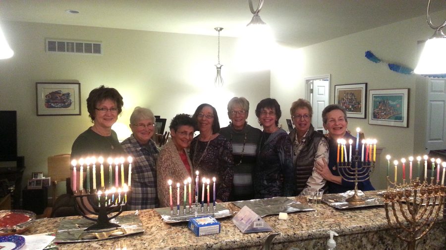 Members of the mishpacha group celebrate Hanukkah in 2015.