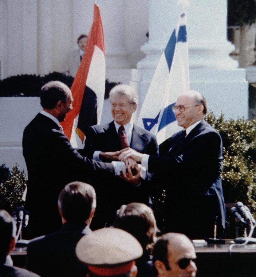 MARCH+26%3A%C2%A0Egyptian+President+Anwar+Sadat%2C+U.S.+President+Jimmy+Carter+and+Israeli+Prime+Minister+Menachem+Begin+shake+hands+at+the+White+House+signing+ceremony+for+the+peace+treaty+March+26%2C+1979.+Photo+by+Ya%E2%80%99acov+Sa%E2%80%99ar%2C+Israeli+Government+Press+Office