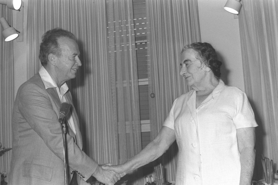 APRIL 10: Golda Meir wishes her successor as prime minister, Yitzhak Rabin, good luck during her farewell party in Jerusalem on June 4, 1974. Photo: Ya’acov Sa’ar, Israeli Government Press Office