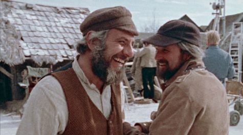 Director Norman Jewison and actor Chaim Topol (Tevye) share a laugh on the set of the 1971 film “Fiddler on the Roof.” Courtesy of Zeitgeist Films.