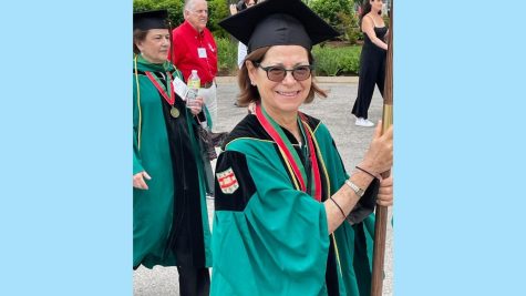 She missed graduation to get married. 50-years later Gail Lang walks with Wash U 72
