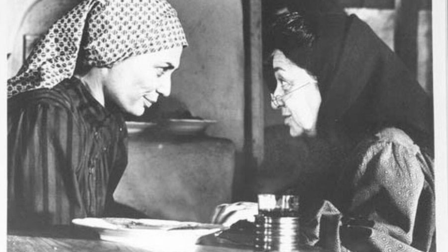Molly Picon (right) as Yente the Matchmaker in the 1971 film Fiddler on the Roof (via Digital Yiddish Theatre Project).