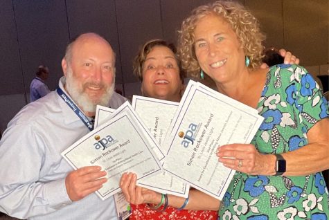 From left, Jordan Palmer, Betsy Schmidt and Ellen Futterman of the Jewish Light hold the 2022 Rockower Awards the paper won during the American Jewish Press Associations annual award banquet on June 27 in Atlanta.