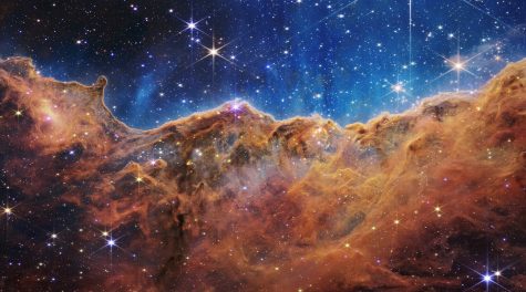 An image released by NASA on July 12, 2022, shows the edge of a nearby, young, star-forming region in the Carina Nebula, captured in infrared light by NASAs James Webb Space Telescope. (NASA, ESA, CSA, STScI/Handout via Xinhua)