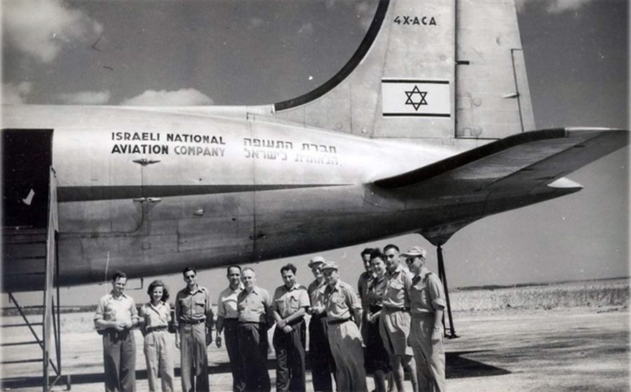 Nov.+15%3A+A+military+DC-4+is+repainted+as+the+first+El+Al+commercial+aircraft+to+transport+Chaim+Weizmann+from+Geneva+to+Israel+in+September+1948.+Photo%3A+El+Al+Archives