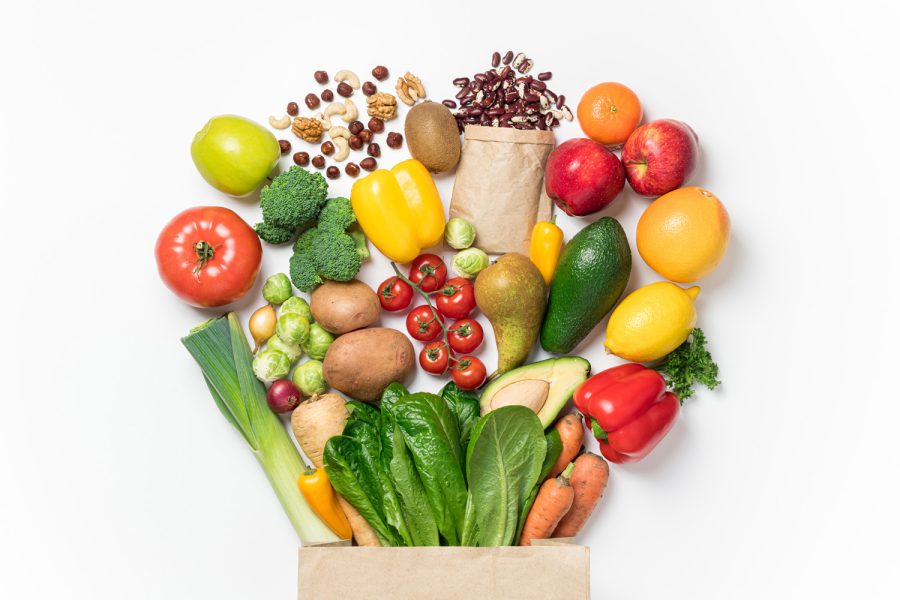 Healthy+food+background.+Healthy+food+in+paper+bag+vegetables+and+fruits+on+white.+Shopping+food+supermarket+concept.+Food+delivery%2C+groceries%2C+vegan%2C+vegetarian+eating.+Top+view