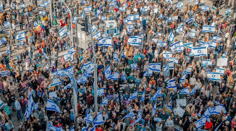 Israelis protest against the proposed changes to the legal system in Haifa, on February 20, 2023. (Shir Torem/Flash90)