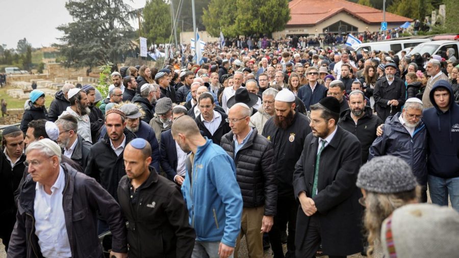 Thousands of family and friends attend the funeral of Lucy Dee at the Gush Etzion Regional Cemetery in Kfar Etzion on April 11, 2023. Photo by Noam Revkin Fenton/Flash90.