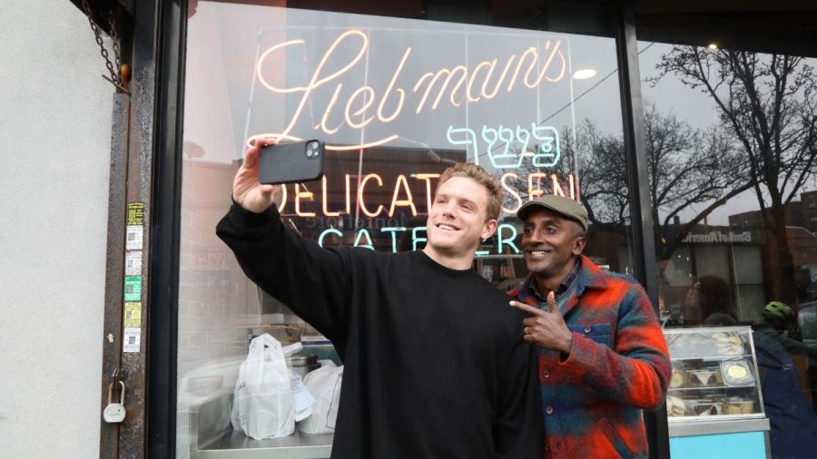 New York Yankees outfielder Harrison Bader, left, and celebrity chef Marcus Samuelsson at Liebmans Deli in the Bronx. (E.H. Wallop/YES Network)