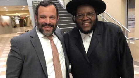 Rabbi Yosef David (left)  and Nissim Black.